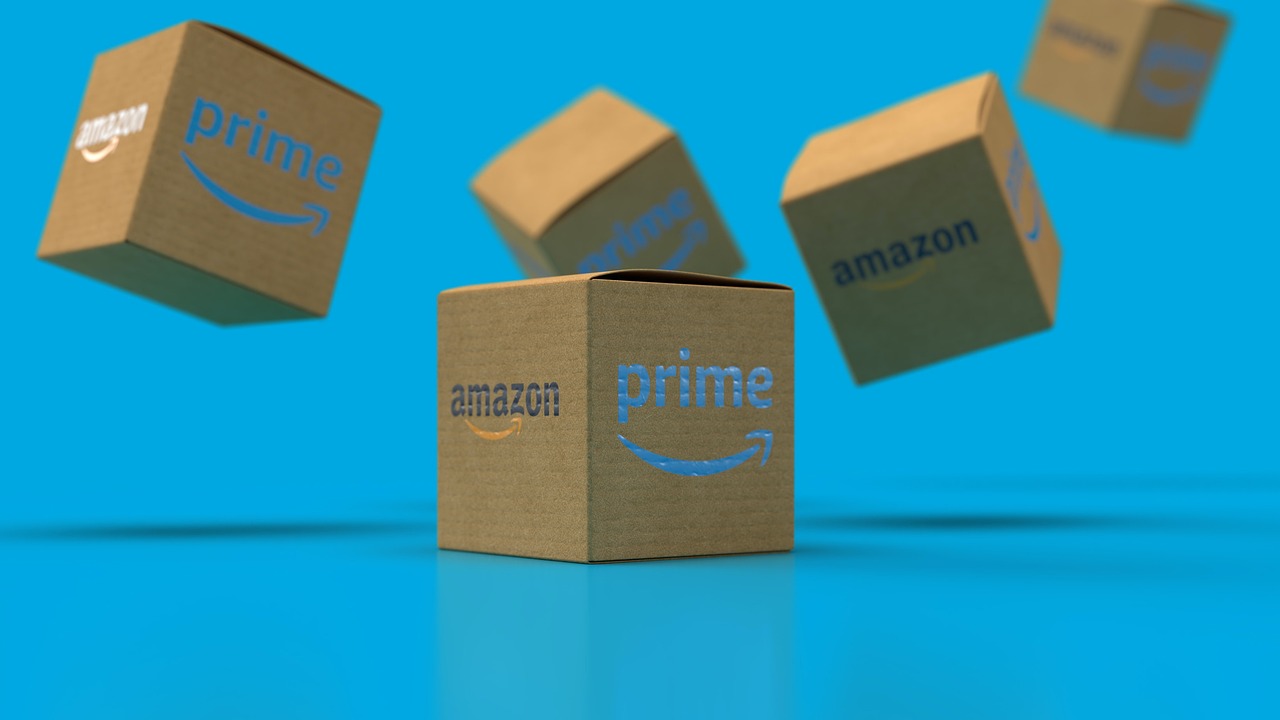 Multiple Amazon boxes on a blue background.