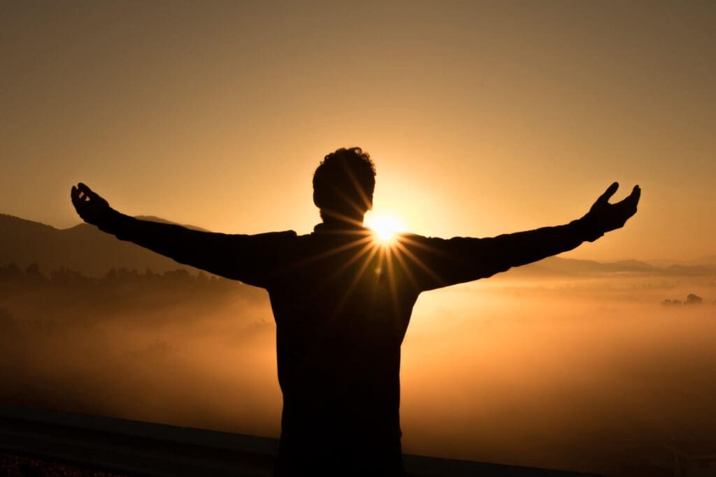 Man with arms up signifying a successful amazon product launch using the product launch checklist